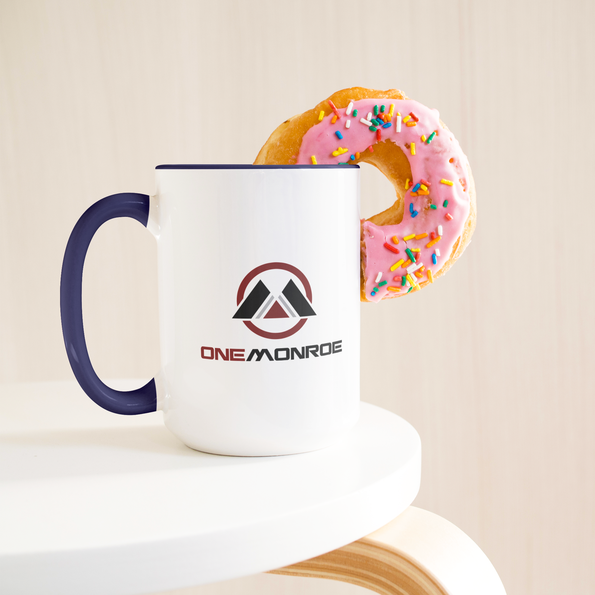 White_and_dark_blue_OneMonroe_15oz_mug-T_Donut_LH_Mockup.png