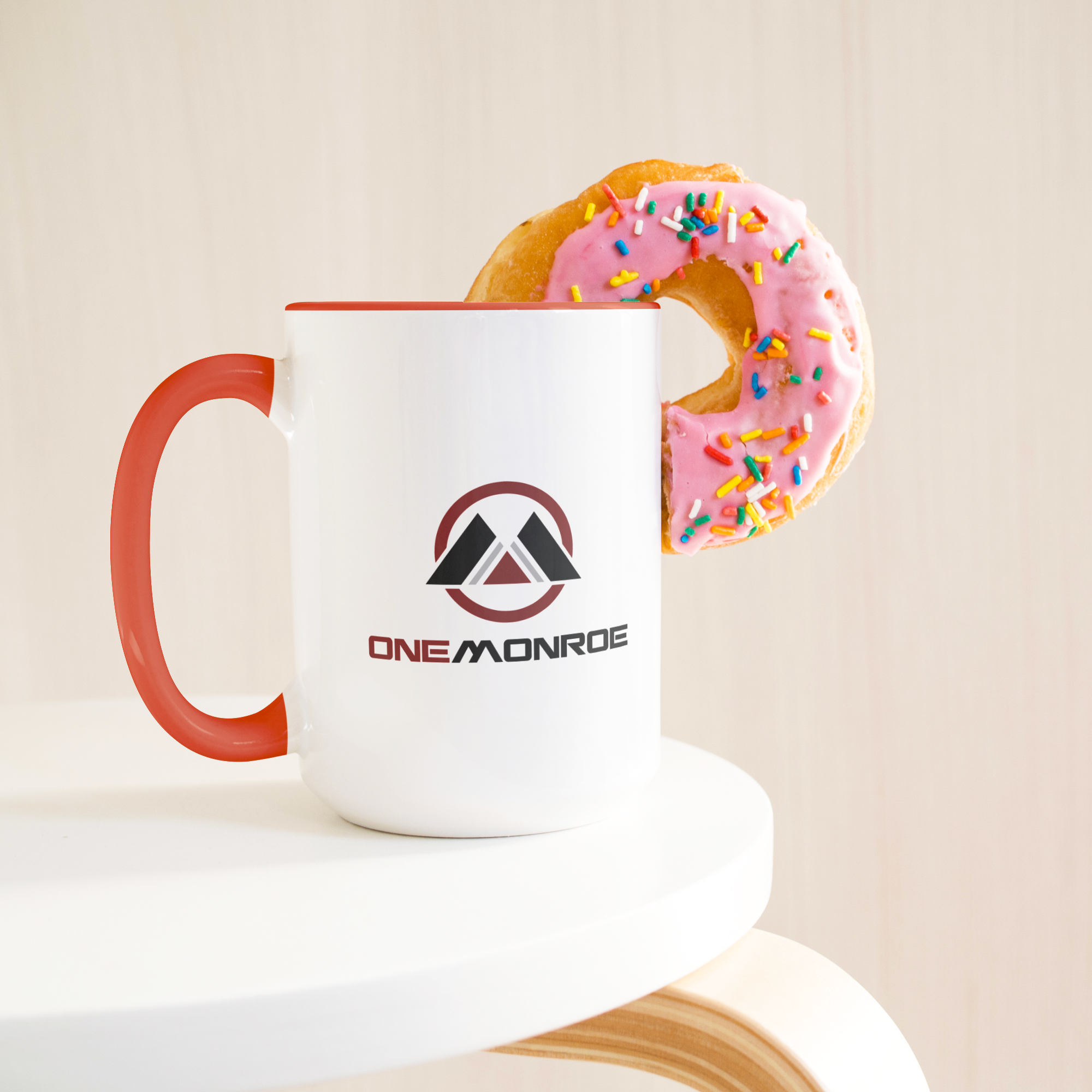 White_and_orange_OneMonroe_15oz_mug-TeeL_Donut_LH_Mockup.png